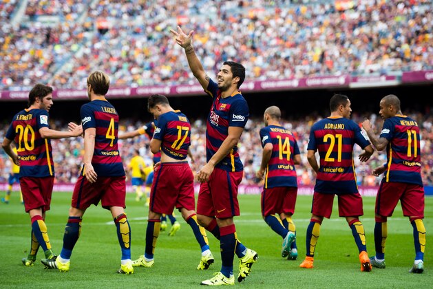 BARCELONA, SPAIN - SEPTEMBER 26:  Luis Suarez (C) of FC Barcelona celebrates after scoring the opening goal during the La Liga match between FC Barcelona and UD Las Palmas at Camp Nou on September 26, 2015 in Barcelona, Spain.  (Photo by Alex Caparros/Getty Images)