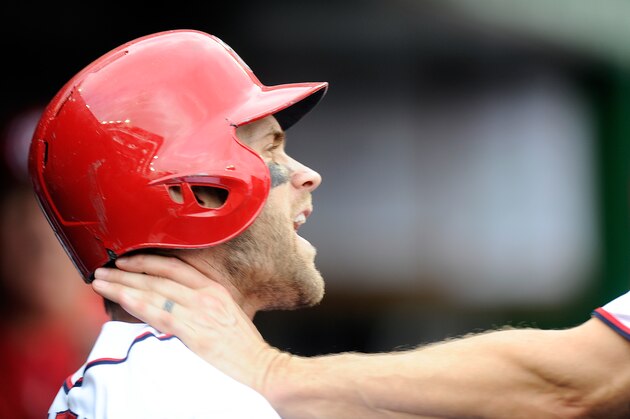 WASHINGTON, DC - SEPTEMBER 27:  Bryce Harper #34 of the Washington Nationals is grabbed by Jonathan Papelbon #58 in the eighth inning against the Philadelphia Phillies at Nationals Park on September 27, 2015 in Washington, DC.  (Photo by Greg Fiume/Getty Images)