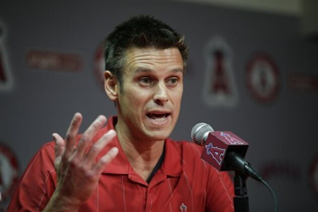 FILE - In this April 3, 2015 file photo, Los Angeles Angels General Manager Jerry Dipoto speaks to reporters during a news conference in Anaheim, Calif.  The Seattle Mariners have found their new general manager, hiring former Angels GM Jerry Dipoto. Seattle announced Dipoto's hiring Monday, Sept. 28, 2015. He replaces Jack Zduriencik, who was fired in late August after seven disappointing seasons during which the club failed to end its playoff drought. (AP Photo/Jae C. Hong)