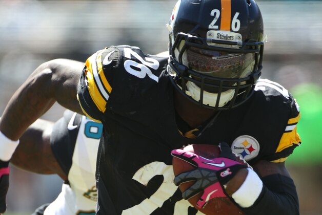 LeVeon Bell #26 of the Pittsburgh Steelers plays during an NFL football game between the Pittsburgh Steelers and the Jacksonville Jaguars, Sunday, Oct. 5, 2014, in Jacksonville, Fla. (Photo by Marc Serota/Panini)