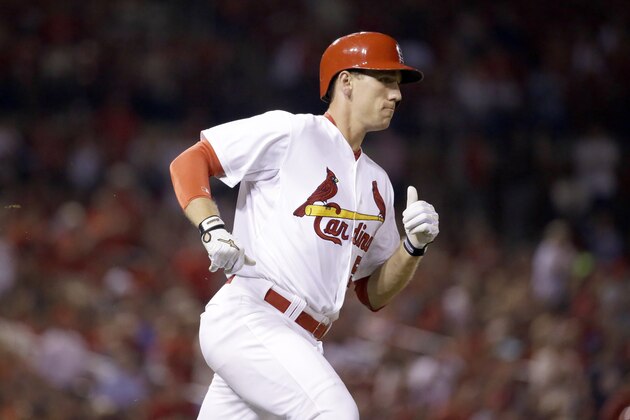St. Louis Cardinals' Stephen Piscotty runs to first on an RBI single during the seventh inning of a baseball game against the Milwaukee Brewers on Thursday, Sept. 24, 2015, in St. Louis. (AP Photo/Jeff Roberson)