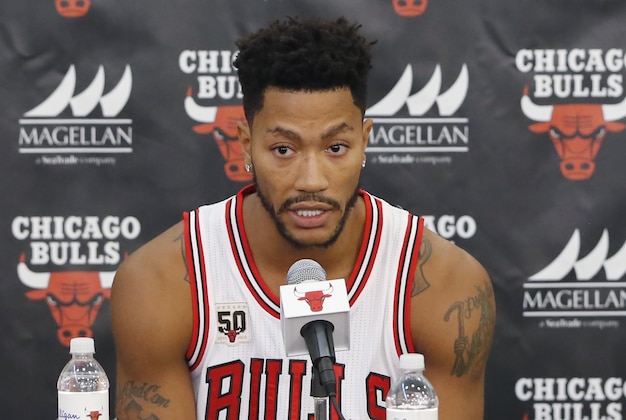 Chicago Bulls guard Derrick Rose, left, responds to a question as Joakim Noah listens during an NBA basketball media day news conference Monday, Sept. 28, 2015, in Chicago. (AP Photo/Charles Rex Arbogast)