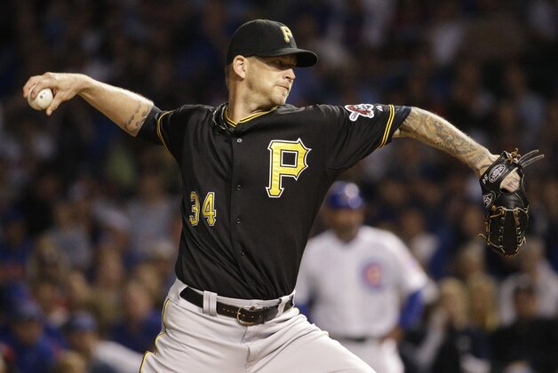 Pittsburgh Pirates starter A.J. Burnett throws against the Chicago Cubs during the first inning of a baseball game Sunday, Sept. 27, 2015, in Chicago. (AP Photo/Nam Y. Huh)