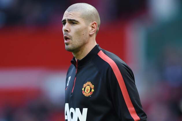 MANCHESTER, ENGLAND - JANUARY 31:  Goalkeeper Victor Valdes of Manchester United warms up prior to kickoff during the Barclays Premier League match between Manchester United and Leicester City at Old Trafford on January 31, 2015 in Manchester, England.  (Photo by Michael Regan/Getty Images)