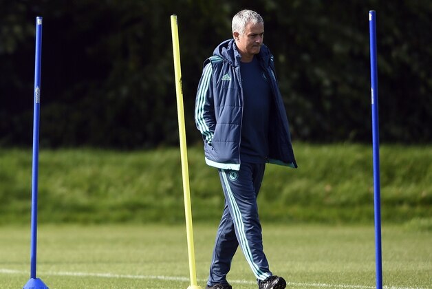 Chelsea's Portuguese manager Jose Mourinho walks on the pitch during a training session at Chelsea's training ground in Stoke D'Abernon, south of London, on September 28, 2015, on the eve of their UEFA Champions League Group G football match against Porto.   AFP PHOTO / FRANCK FIFE        (Photo credit should read FRANCK FIFE/AFP/Getty Images)