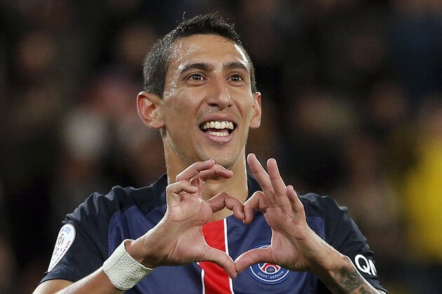 PSG's Angel Di Maria celebrates after scoring during the  French League One soccer match between Paris Saint Germain and Guingamp, at the Parc des Princes stadium in Paris, France, Tuesday, Sept. 22, 2015. (AP Photo/Thibault Camus)
