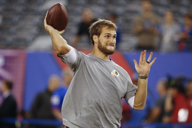 Washington Redskins quarterback Kirk Cousins throws a pass before an NFL football game against the New York Giants Thursday, Sept. 24, 2015, in East Rutherford, N.J.  (AP Photo/Kathy Willens)
