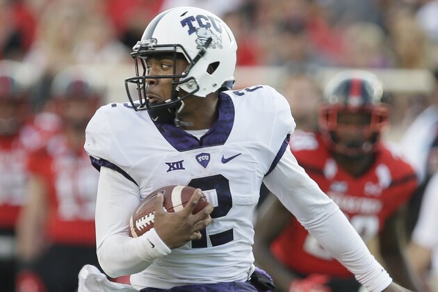 TCU quarterback Trevone Boykin (2) is grabbed by Texas Tech linebacker Pete Robertson (10) during the first second half of an NCAA college football game Saturday, Sept. 26, 2015, in Lubbock, Texas. (AP Photo/LM Otero)
