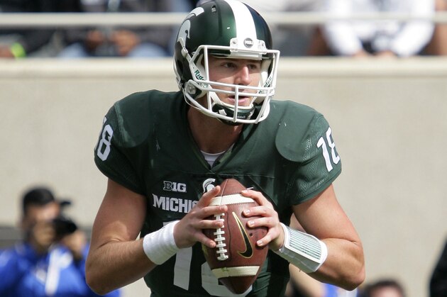 Michigan State quarterback Connor Cook rolls out against Air Force during the fourth quarter of an NCAA college football game, Saturday, Sept. 19, 2015, in East Lansing, Mich. Michigan State won 35-21. (AP Photo/Al Goldis)