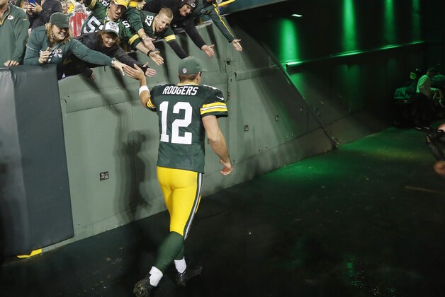 Green Bay Packers' Aaron Rodgers heads to the locker room after an NFL football game against the Kansas City Chiefs Monday, Sept. 28, 2015, in Green Bay, Wis. The Packers won 38-28. (AP Photo/Mike Roemer)
