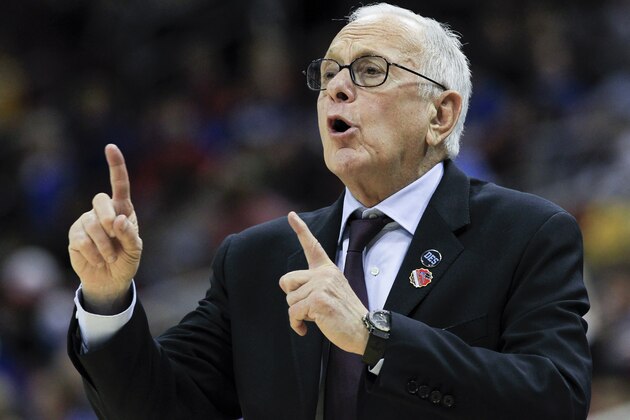SMU head coach Larry Brown directs his team against UCLA during the first half in the second round of the NCAA college basketball tournament in Louisville, Ky., Thursday, March 19, 2015. UCLA won 60-59. (AP Photo/David Stephenson)
