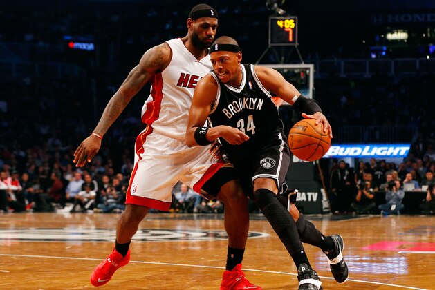 NEW YORK, NY - JANUARY 10:  (NEW YORK DAILIES OUT)   Paul Pierce #34 of the Brooklyn Nets in action against LeBron James #6 of the Miami Heat at Barclays Center on January 10, 2014 in the Brooklyn borough of New York City.The Wizards defeated the Nets 113-107.  NOTE TO USER: User expressly acknowledges and agrees that, by downloading and/or using this Photograph, user is consenting to the terms and conditions of the Getty Images License Agreement.  (Photo by Jim McIsaac/Getty Images)