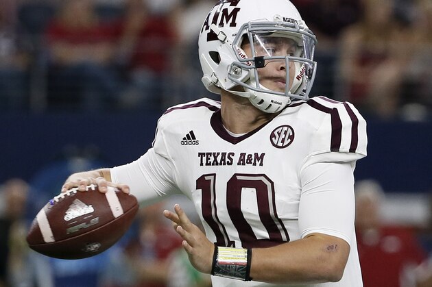 Texas A&M quarterback Kyle Allen prepares to pass during the first half of an NCAA college football game against Arkansas on Saturday, Sept. 26, 2015, in Arlington, Texas. (AP Photo/Tony Gutierrez)