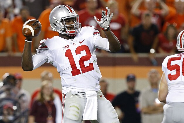 Sep 7, 2015; Blacksburg, VA, USA; Ohio State Buckeyes quarterback Cardale Jones (12) throws the ball against the Virginia Tech Hokies at Lane Stadium. Mandatory Credit: Geoff Burke-USA TODAY Sports