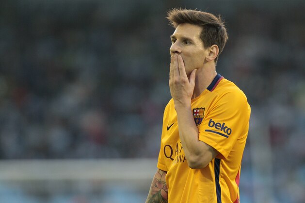 Barcelona's Lionel Messi from Argentina, gestures during a Spanish La Liga soccer match between RC Celta and FC Barcelona, at the Balaídos stadium in Vigo, Spain, Wednesday, Sept. 23, 2015. (AP Photo/Lalo R. Villar)