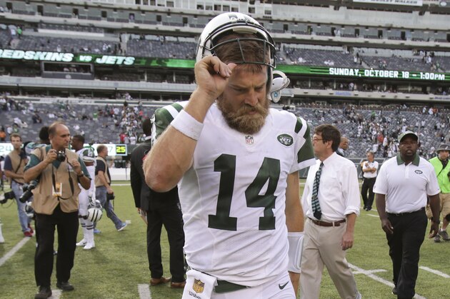 New York Jets quarterback Ryan Fitzpatrick (14) walks off the field after the Jets lost to the Philadelphia Eagles 24-17 during an NFL football game, Sunday, Sept. 27, 2015, in East Rutherford, N.J. (AP Photo/Adam Hunger)