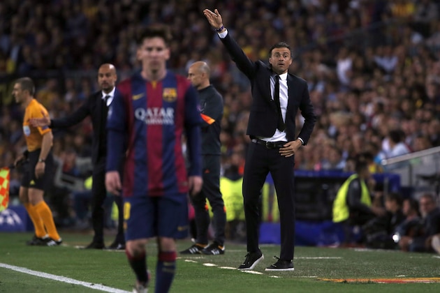 Barcelona’s head coach Luis Enrique, right, gestures as Barcelona's Lionel Messi walks in front of him during the Champions League semifinal first leg soccer match between Barcelona and Bayern Munich at the Camp Nou stadium in Barcelona, Spain, Wednesday, May 6, 2015. (AP Photo/Emilio Morenatti) Barcelona’s head coach Luis Enrique, right, gestures as Barcelona's Lionel Messi walks in front of him during the Champions League semifinal first leg soccer match between Barcelona and Bayern Munich at the Camp Nou stadium in Barcelona, Spain, Wednesday, May 6, 2015. (AP Photo/Emilio Morenatti)