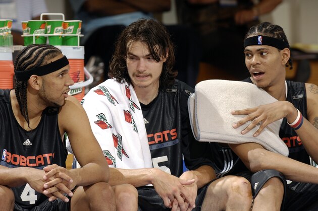 MAITLAND, FL - JULY 10: Jared Dudley #4, Adam Morrison #35 and Jermareo Davidson #33 of the Charlotte Bobcats chat on the bench during the game against the Chicago Bulls at the 2007 Pepsi Pro Summer League at the RDV Sportsplex on July 10, 2007 in Maitland, Florida.  NOTE TO USER: User expressly acknowledges and agrees that, by downloading and/or using this Photograph, user is consenting to the terms and conditions of the Getty Images License Agreement. Mandatory Copyright Notice:  Copyright 2007 NBAE (Photo by Fernando Medina/NBAE via Getty Images)