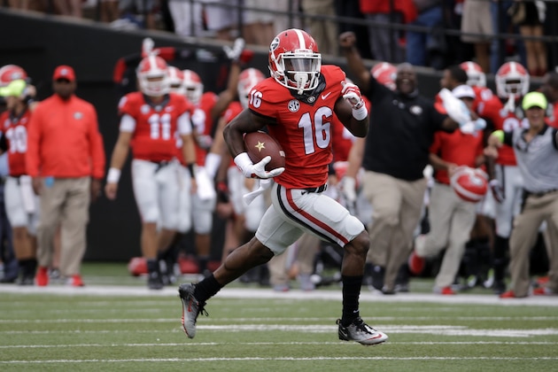 Georgia's Isaiah McKenzie (16) returns a punt 77 yards for a touchdown against Vanderbilt in the first half of an NCAA college football game Saturday, Sept. 12, 2015, in Nashville, Tenn. (AP Photo/Mark Humphrey)