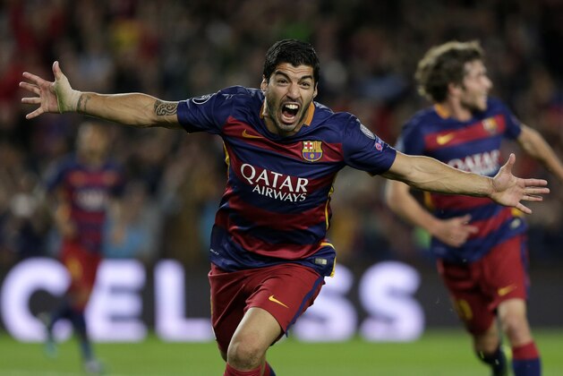 Barcelona's Luis Suarez celebrates after scoring the second goal of his team during a Champions League Group E soccer match between Barcelona and Bayer Leverkusen at Camp Nou stadium in Barcelona, Spain, Tuesday, Sept. 29, 2015. (AP Photo/Emilio Morenatti)