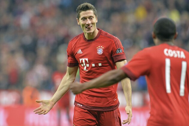 Bayern's Robert Lewandowski celebrates after scoring during the Champions League group F soccer match between Bayern Munich and Dinamo Zagreb in Munich, Germany, Tuesday, Sept. 29, 2015.(AP Photo/Kerstin Joensson)