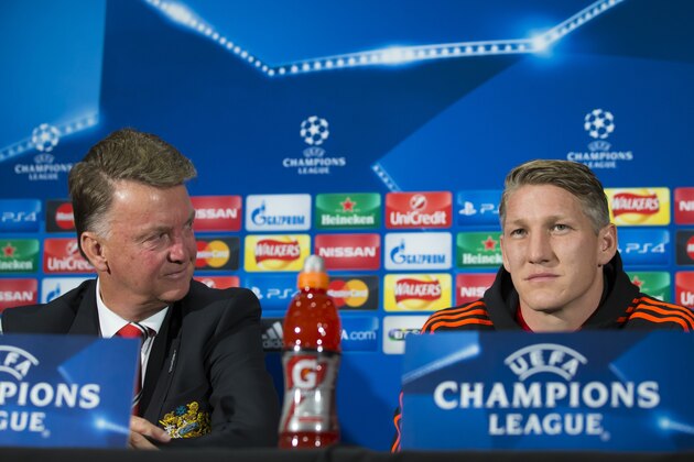 Manchester United's manager Louis van Gaal, left, and Bastian Schweinsteiger answer questions during a press conference at Old Trafford Stadium, Manchester, England, Tuesday, Sept. 29, 2015. Manchester United will play VFL Wolfsberg in a Champions League group B soccer match on Wednesday.  (AP Photo/Jon Super)