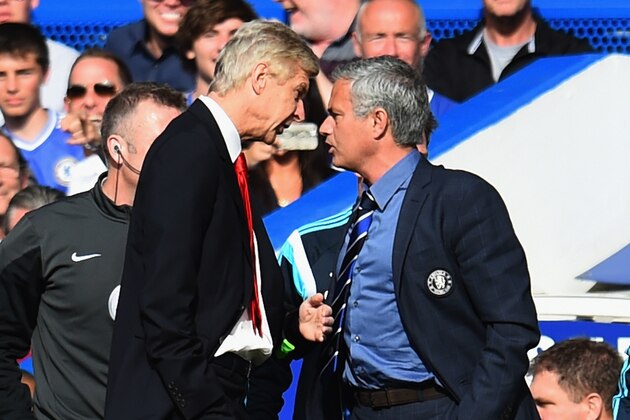 LONDON, ENGLAND - OCTOBER 05:  Managers Arsene Wenger of Arsenal and Jose Mourinho manager of Chelsea clash during the Barclays Premier League match between Chelsea and Arsenal at Stamford Bridge on October 4, 2014 in London, England.  (Photo by Shaun Botterill/Getty Images)