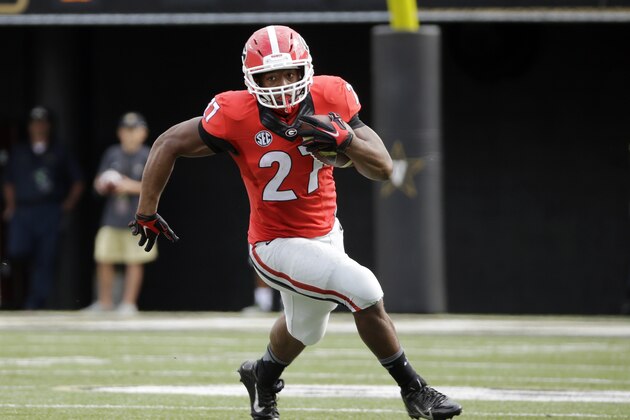 Georgia running back Nick Chubb carries the ball against Vanderbilt in the first half of an NCAA college football game Saturday, Sept. 12, 2015, in Nashville, Tenn. Chubb ran for 189 yards as Georgia won 31-14. (AP Photo/Mark Humphrey)