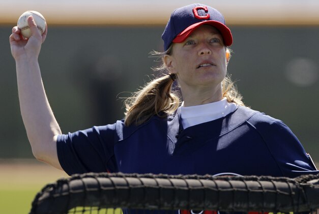 Justine Siegal throws batting practice to Cleveland Indians catchers during baseball spring training, Monday, Feb. 21, 2011, in Goodyear, Ariz. Siegal became the first woman to pitch batting practice at a Major League camp. (AP Photo/Mark Duncan)