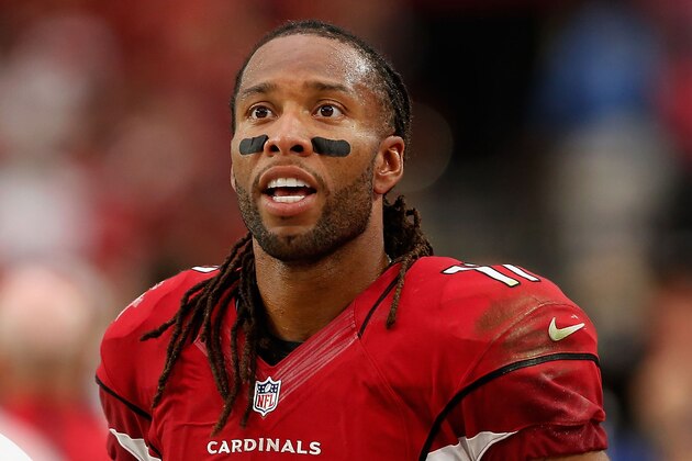GLENDALE, AZ - SEPTEMBER 27:  Wide receiver Larry Fitzgerald #11 of the Arizona Cardinals watches from the sidelines during the fourth quarter of the NFL game against the San Francisco 49ers at the University of Phoenix Stadium on September 27, 2015 in Glendale, Arizona.  The Carindals defeated the 49ers 47-7.  (Photo by Christian Petersen/Getty Images)