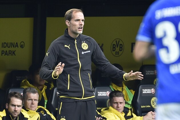 Dortmund's head coach Thomas Tuchel gestures during the German Bundesliga soccer match between Borussia Dortmund and SV Darmstadt in Dortmund, Germany, Sunday, Sept. 27, 2015. The match ended 2-2. (AP Photo/Martin Meissner)