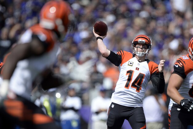 Sep 27, 2015; Baltimore, MD, USA; Cincinnati Bengals quarterback Andy Dalton (14) passes during the first quarter against the Baltimore Ravens at M&T Bank Stadium. Mandatory Credit: Tommy Gilligan-USA TODAY Sports