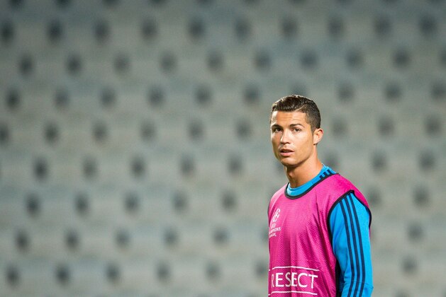 Real Madrid's Portuguese forward Cristiano Ronaldo takes part in a training session at the Swedbank Stadion, on September 29, 2015, on the eve of the UEFA Champions League Group A football match between Malmo FF and Real Madrid CF. AFP PHOTO / JONATHAN NACKSTRAND        (Photo credit should read JONATHAN NACKSTRAND/AFP/Getty Images)