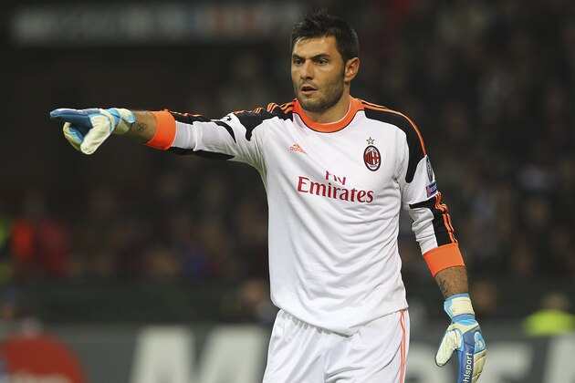 MILAN, ITALY - OCTOBER 22:  Marco Amelia of AC Milan gestures during the UEFA Champions League Group H match between AC Milan and FC Barcelona at Stadio Giuseppe Meazza on October 22, 2013 in Milan, Italy  (Photo by Marco Luzzani/Getty Images)