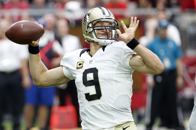 New Orleans Saints quarterback Drew Brees (9) throws against the Arizona Cardinals during the first half of an NFL football game, Sunday, Sept. 13, 2015, in Glendale, Ariz. (AP Photo/Ross D. Franklin)