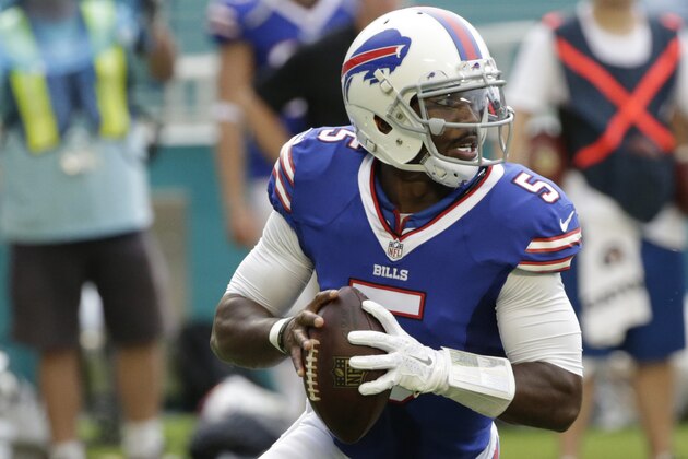 Buffalo Bills quarterback Tyrod Taylor (5) runs with the ball during the first half of an NFL football game against the Miami Dolphins, Sunday, Sept. 27, 2015 in Miami Gardens, Fla. (AP Photo/Wilfredo Lee)