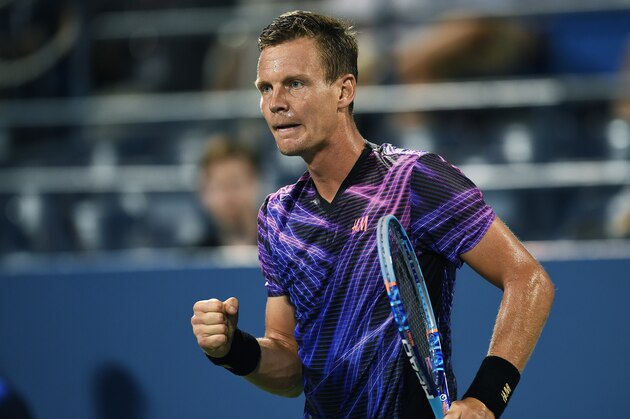 Tomas Berdych of Czech Republic reacts to winning a set against Richard Gasquet of France during their 2015 US Open Men's singles round 4 match at the USTA Billie Jean King National Tennis Center in New York on September 7, 2015. AFP PHOTO/JEWEL SAMAD        (Photo credit should read JEWEL SAMAD/AFP/Getty Images)
