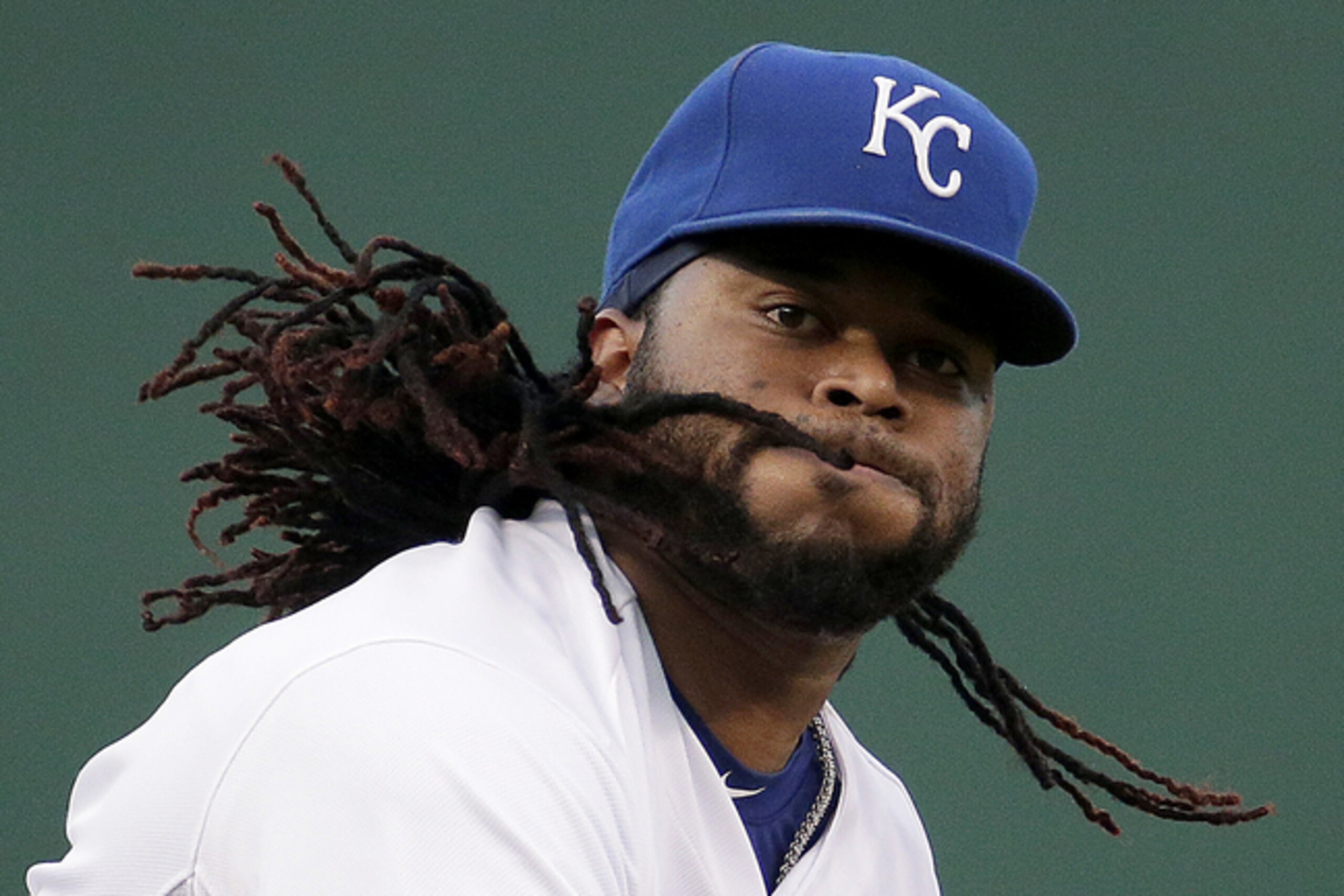 Kansas City Royals starting pitcher Johnny Cueto throws during the first inning of a baseball game against the Detroit Tigers Tuesday, Sept. 1, 2015, in Kansas City, Mo. (AP Photo/Charlie Riedel)
