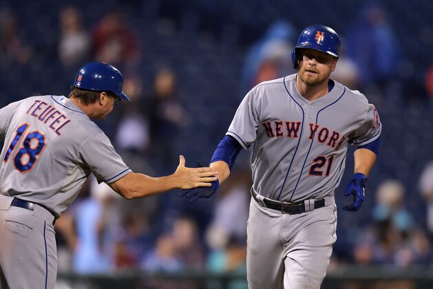 PHILADELPHIA, PA - SEPTEMBER 29: Tim Teufel #18 of the New York Mets congratulates Lucas Duda #21 after his second home run of the game in the ninth inning against the Philadelphia Phillies at Citizens Bank Park on September 29, 2015 in Philadelphia, Pennsylvania. The Phillies won 4-3. (Photo by Drew Hallowell/Getty Images)