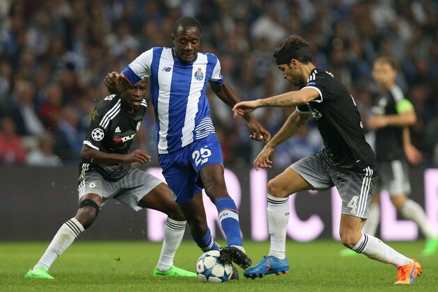 Porto’s Giannelli Imbula drives the ball past Chelsea's Cesc Fabregas, right, during the Champions League group G soccer match between FC Porto and Chelsea FC at the Dragao stadium in Porto, Portugal, Tuesday, Sept. 29, 2015.  (AP Photo/Steven Governo)