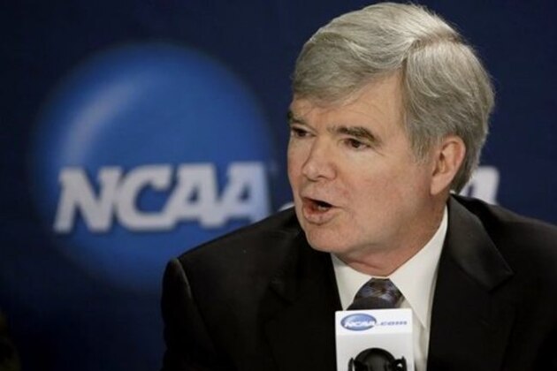 FILE - In this April 6, 2014, file photo, NCAA President Mark Emmert answers a question at a news conference in Arlington, Texas. The National Labor Relations Board has dismissed a historic ruling that Northwestern University football players are school employees who are entitled to form what would be the nation's first union of college athletes. The NLRB released its decision Monday, Aug. 17, 2015. The losing side does not have an option to appeal.(AP Photo/David J. Phillip, File)