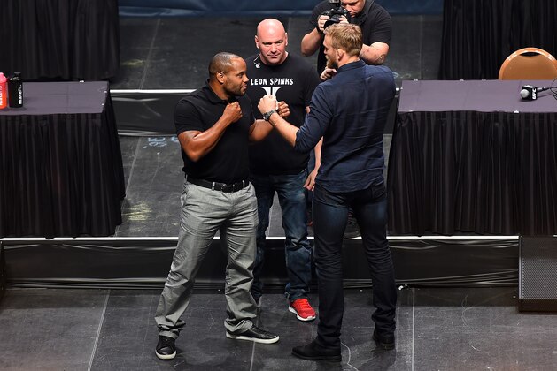 LAS VEGAS, NEVADA - SEPTEMBER 04:  (L-R) UFC light heavyweight champion Daniel Cormier and challenger Alexander Gustafson face off during the UFC's Go Big launch event inside MGM Grand Garden Arena on September 4, 2015 in Las Vegas, Nevada. (Photo by Jeff Bottari/Zuffa LLC/Zuffa LLC via Getty Images)