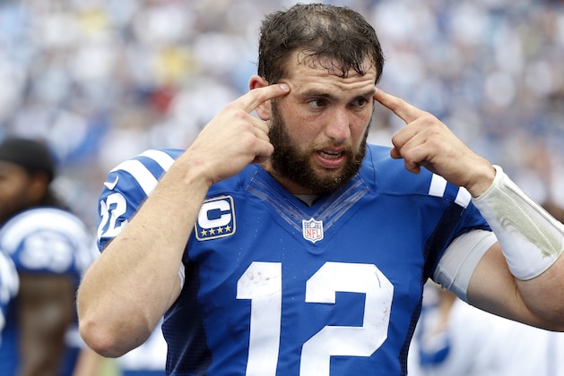 Indianapolis Colts quarterback Andrew Luck talks with teammates on the sideline in the second half of an NFL football game against the Tennessee Titans Sunday, Sept. 27, 2015, in Nashville, Tenn. The Colts won 35-33. (AP Photo/Weston Kenney)