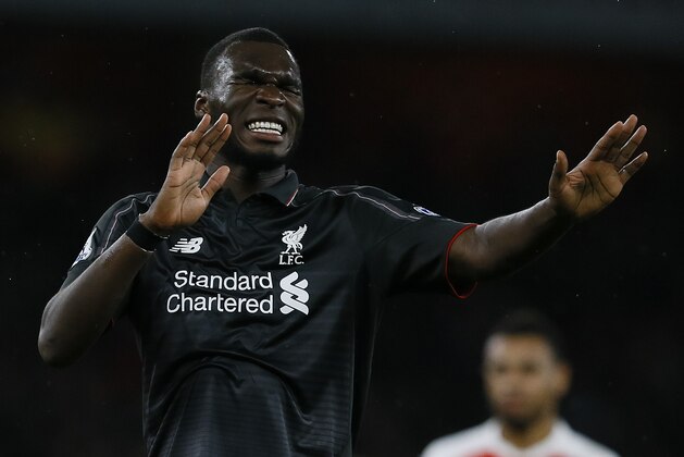 Liverpool's Christian Benteke reacts after a missed opportunity during the English Premier League soccer match between Arsenal and Liverpool at Emirates stadium in London, Monday, Aug. 24, 2015. (AP Photo/Kirsty Wigglesworth)