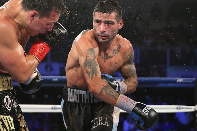 VERONA , NY - APRIL 18: Lucas Matthysse (R) throws a right cross to the head of Ruslan Provodnikov at the Turning Stone Resort Casino on April 18, 2015 in Verona, New York.  Matthysee won the 12 round bout by scores of 114-114, 115-113 and 115-113. (Photo by Alex Menendez/Getty Images)