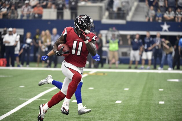 Atlanta Falcons wide receiver Julio Jones (11) grabs a pass during an NFL football game against the Dallas Cowboys Sunday, Sept. 27, 2015, in Arlington, Texas. (AP Photo/Michael Ainsworth)