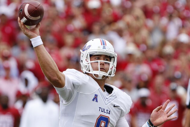 Tulsa quarterback Dane Evans (9) passes against Oklahoma during the third quarter of an NCAA college football game in Norman, Okla., Saturday, Sept. 19, 2015. Oklahoma won 52-38. (AP Photo/Alonzo Adams)