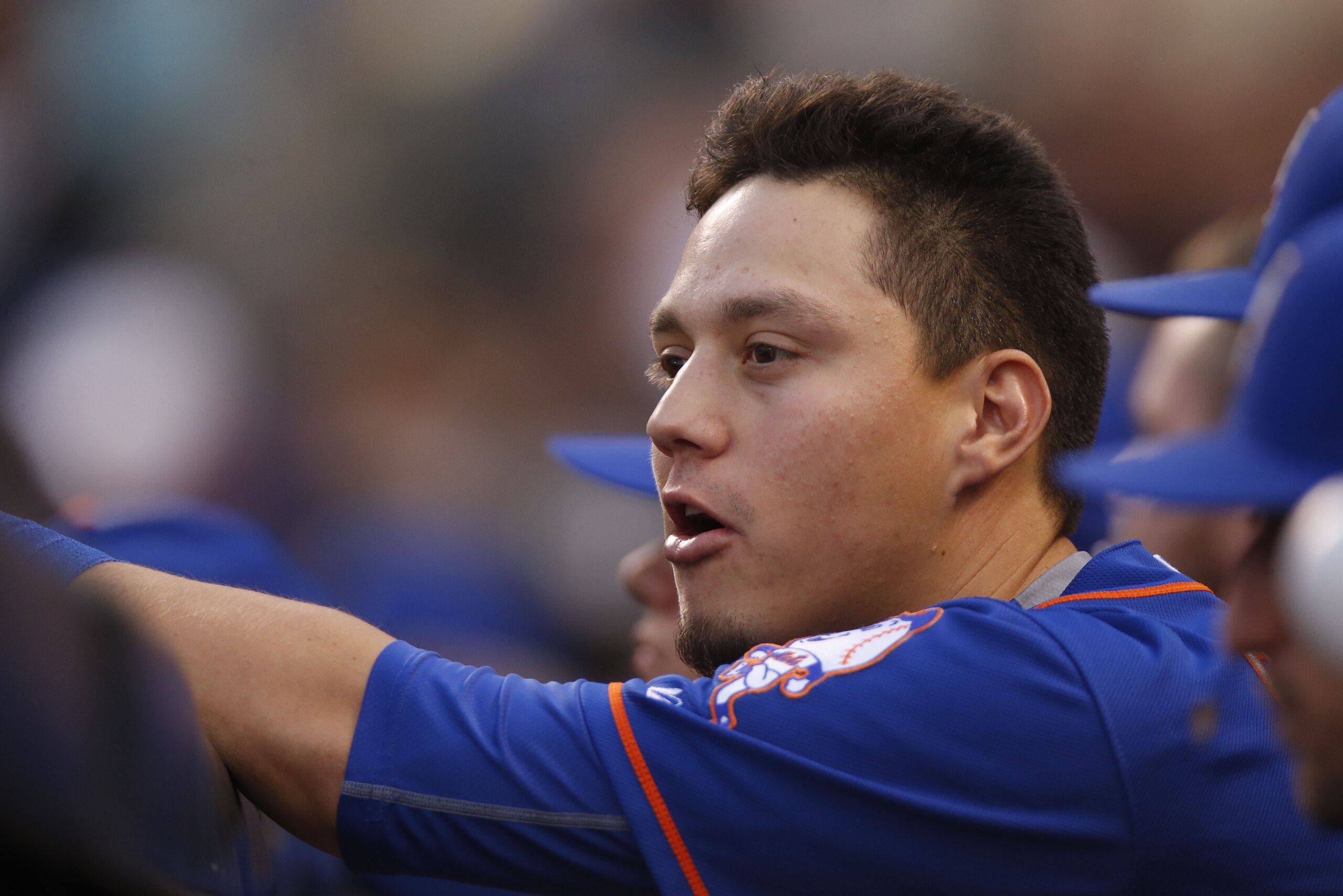 New York Mets shortstop Wilmer Flores (4) in the top of the third inning of a baseball game Saturday, Aug. 22, 2015, in Denver. (AP Photo/David Zalubowski)