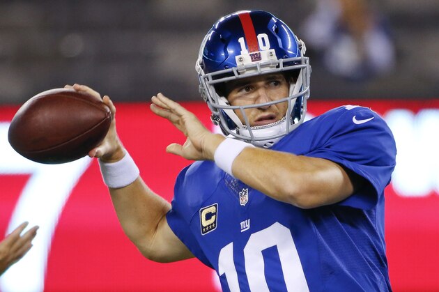 New York Giants quarterback Eli Manning (10) throws a pass before an NFL football game against the Washington Redskins Thursday, Sept. 24, 2015, in East Rutherford, N.J. (AP Photo/Kathy Willens)