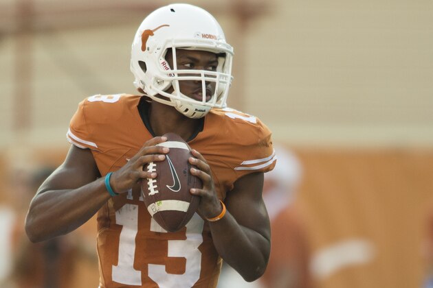 AUSTIN, TX - SEPTEMBER 26:  Jerrod Heard #13 of the Texas Longhorns drops back to pass against the Oklahoma State Cowboys during the 4th quarter on September 26, 2015 at Darrell K Royal-Texas Memorial Stadium in Austin, Texas.  (Photo by Cooper Neill/Getty Images)